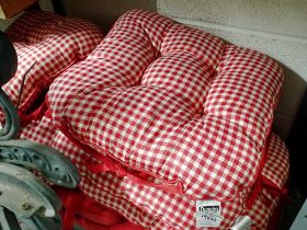 Set of red and white checkered cushions. Not available for in-house P&P