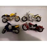 Three Maesto toy motorcycles and a Peugeot scooter toy replica. UK P&P Group 1 (£16+VAT for the