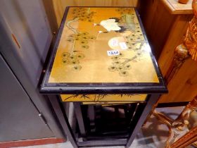 Nest of four Japanese tables, gilt decorated with cranes, H: 66 cm. Not available for in-house P&P