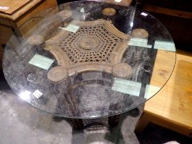Six legged octagonal bamboo table with glass top, D: 90 cm. Not available for in-house P&P