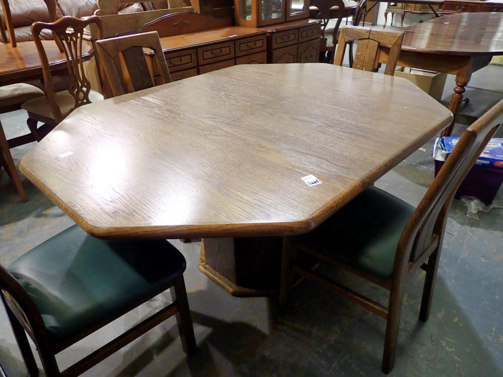 Octagonal oak table and four upholstered chairs. Not available for in-house P&P