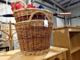 A pair of large wicker log baskets. Not available for in-house P&P