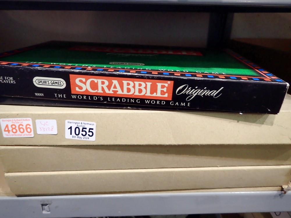 Scrabble and three boxed jigsaws. Not available for in-house P&P