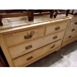 Pine chest of two short over two long drawers, H: 80 cm, L: 104 cm. Not available for in-house P&P