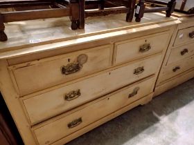 Pine chest of two short over two long drawers, H: 80 cm, L: 104 cm. Not available for in-house P&P