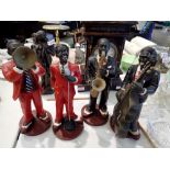 Four piece figural jazz band, largest H: 38 cm. Not available for in-house P&P