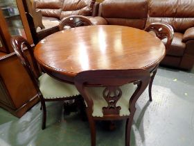 Reflections at Glasson Dock mahogany circular table with four upholstered harp back cabriole leg