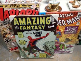 Three canvas prints of comic book covers. Not available for in-house P&P