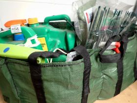 Collection of gardening equipment to include basket liners, hedge shears and various chemicals.