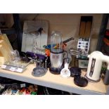 Shelf of mixed kitchen items, including a 'Magic Bullet'. Not available for in-house P&P