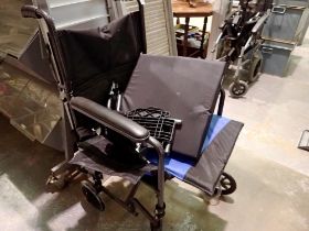 Wheelchair with extra padded seat. Not available for in-house P&P