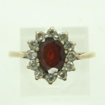 9ct gold ring set with garnet and cubic zirconia, size U, 2.2g. UK P&P Group 0 (£6+VAT for the first
