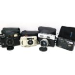 Four compact 35 mm film cameras with cases, including Nikon Zoom 70W AF. UK P&P Group 2 (£20+VAT for