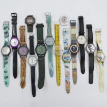 Fourteen assorted mens and ladies Swatch watches. Two watches have straps missing, three have