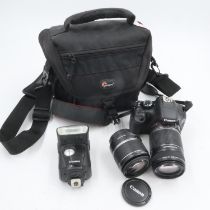 Canon EOS 550D DSLR with two Canon Zoom lenses and flash. UK P&P Group 2 (£20+VAT for the first