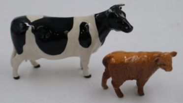 Beswick Fresian cow and a Beswick calf. UK P&P Group 2 (£20+VAT for the first lot and £4+VAT for