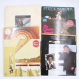 Five Stevie Wonder albums and two 12inch singles. UK P&P Group 2 (£20+VAT for the first lot and £4+