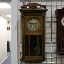 Oak cased Westminster chime wall clock, H: 72 cm. Not available for in-house P&P