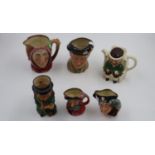 Royal Doulton character jugs D6202 Monty and The Jester; two small jugs Falstaff and Long John