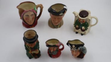 Royal Doulton character jugs D6202 Monty and The Jester; two small jugs Falstaff and Long John