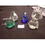 Four glass paperweights including an Isle of Wight example. UK P&P Group 2 (£20+VAT for the first