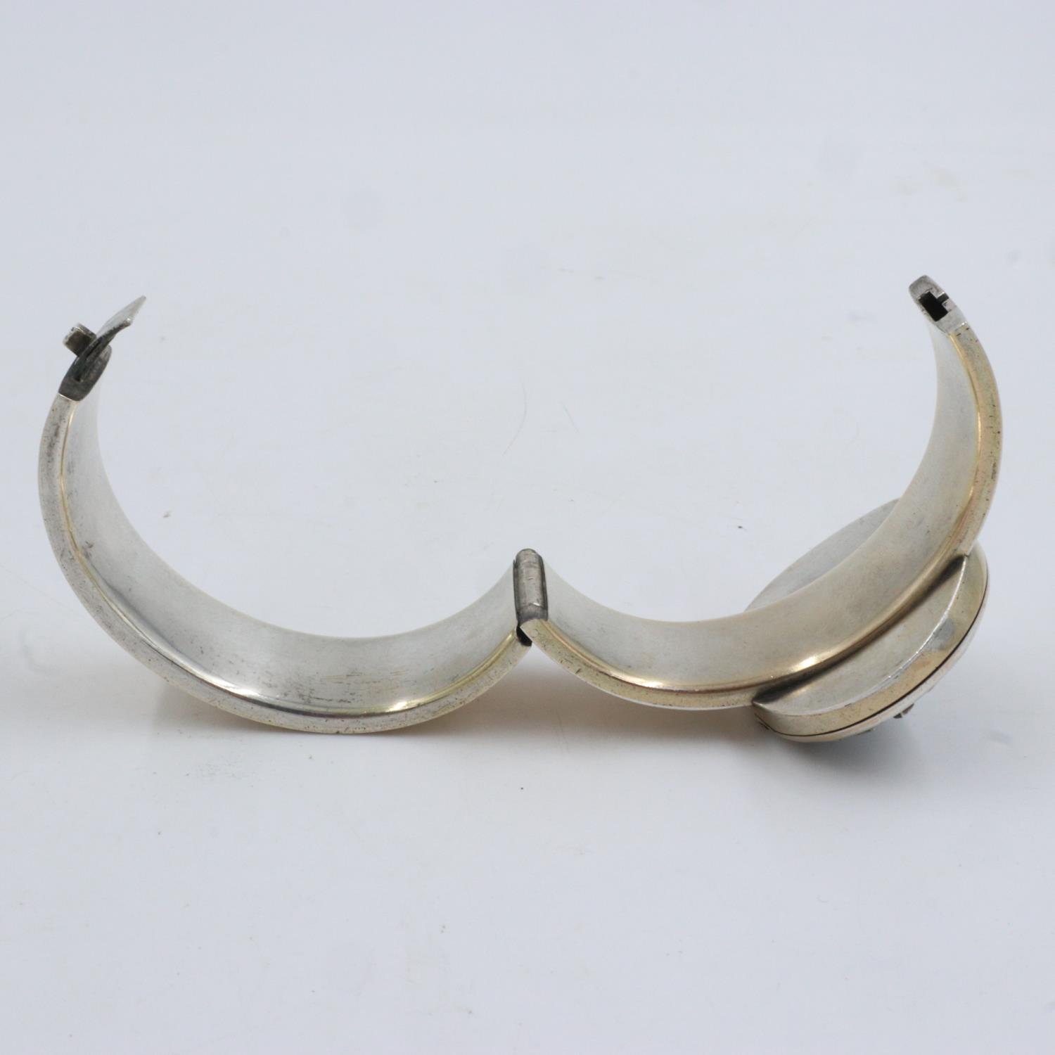 Enamelled white metal bangle with incorporated locket. UK P&P Group 1 (£16+VAT for the first lot and - Image 3 of 3