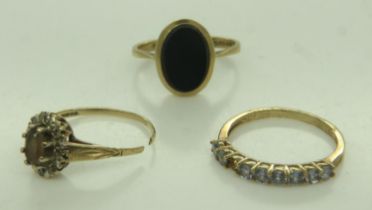 9ct gold signet ring set with a panel of onyx (mis-shapen), 9ct gold half eternity (lacking one