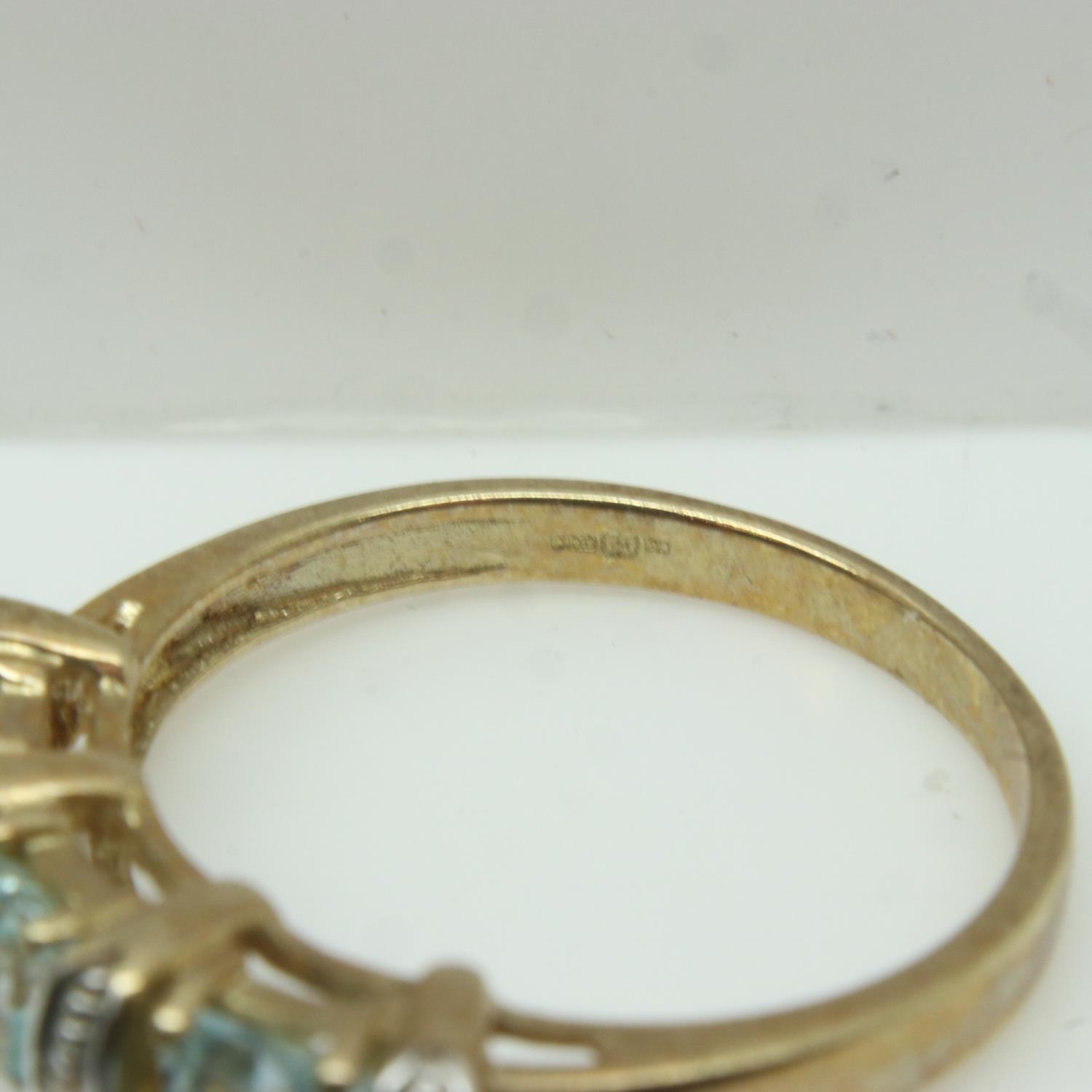 9ct gold dress ring, set with aquamarines and diamonds, size P, 2.9g. P&P Group 0 (£6+VAT for the - Image 3 of 3