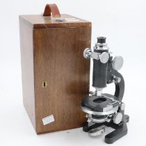 Baker of London microscope, cased with two eyepieces. UK P&P Group 3 (£30+VAT for the first lot