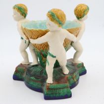 20th century continental majolica planter, supported by three putti figures, small chip to rim, H:
