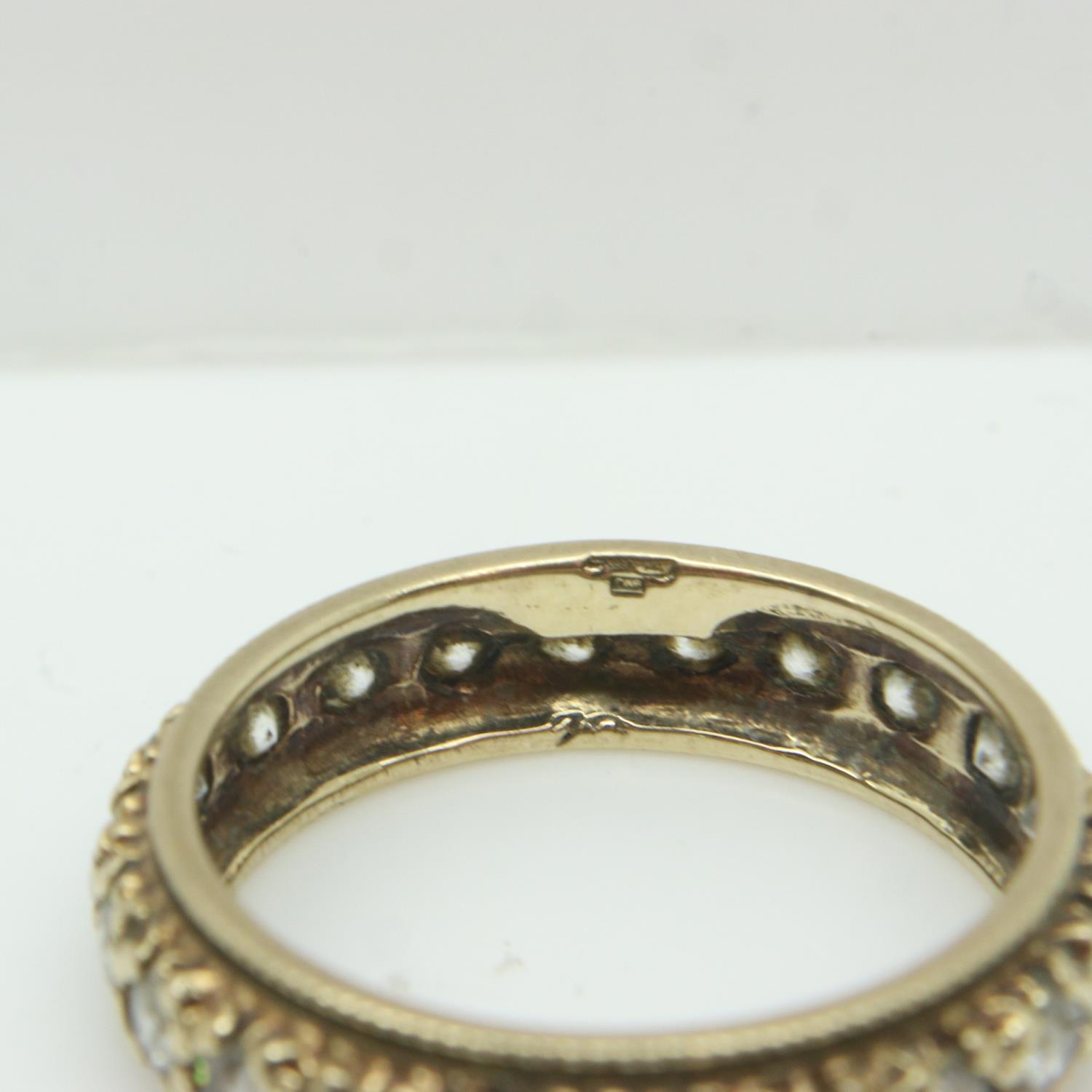 9ct gold band ring set with cubic zirconia, size K/L, 2.4g. UK P&P Group 0 (£6+VAT for the first lot - Image 3 of 3