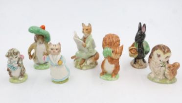 Seven Royal Albert Beatrix Potter figures, largest H: 10 cm, no cracks or chips. UK P&P Group 2 (£