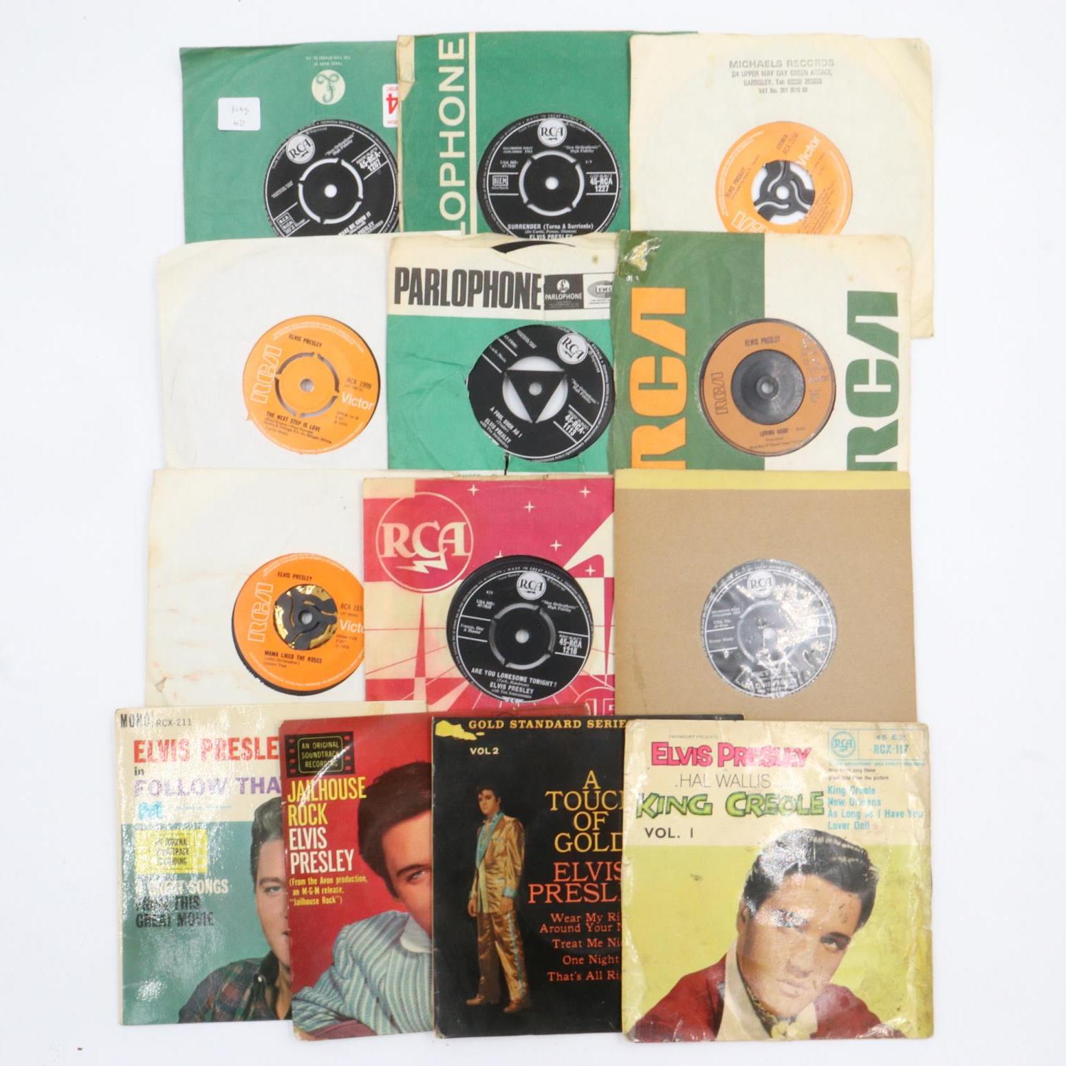 Twelve Elvis Presley singles. UK P&P Group 2 (£20+VAT for the first lot and £4+VAT for subsequent