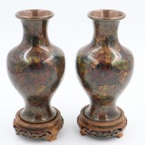 Pair of Japanese Cloisonne vases on wooden stand, slight damage to each, H: 24 cm. UK P&P Group