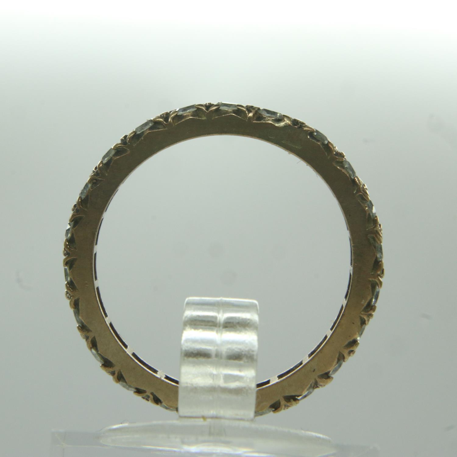 9ct gold stone set eternity ring, unmarked, size N, 2.2g. UK P&P Group 0 (£6+VAT for the first lot - Image 2 of 2