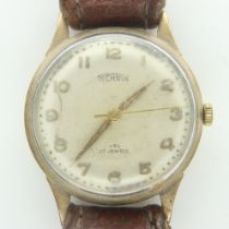 TECHNOS: a 9ct gold cased gents manual wind wristwatch, working at lotting. P&P Group 0 (£6+VAT