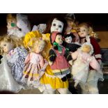 Ten mixed porcelain dolls. Not available for in-house P&P
