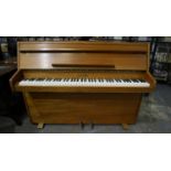Small oak Zender overstrung piano. not available for in house postage