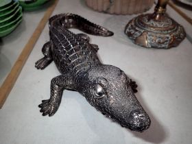 Modern silvered sculpture of a crocodile, 39cm L. UK P&P Group 2 (£20+VAT for the first lot and £4+