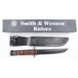 Smith & Wesson combat knife, model SWCOM with leather sheath, boxed. UK P&P Group 2 (£20+VAT for the