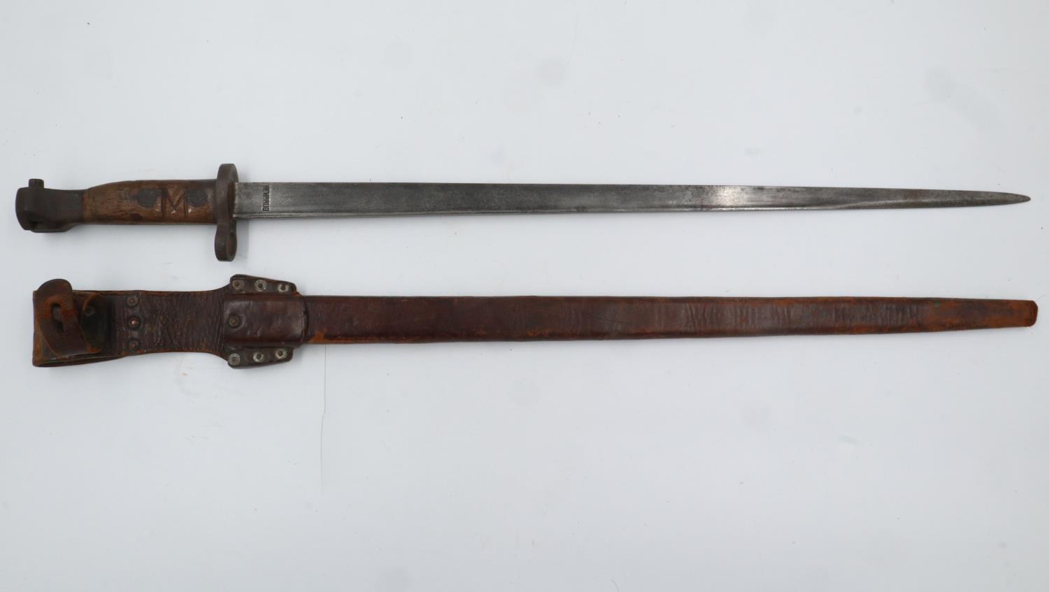A Hembrug Dutch 1895 pattern bayonet with leather scabbard. UK P&P Group 2 (£20+VAT for the first