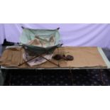 British WWII officers folding canvas bed and sleeping bag, together with canvas wash stand, all in