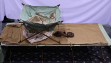 British WWII officers folding canvas bed and sleeping bag, together with canvas wash stand, all in