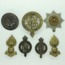 A quantity of British WWI-II cap badges. UK P&P Group 1 (£16+VAT for the first lot and £2+VAT for