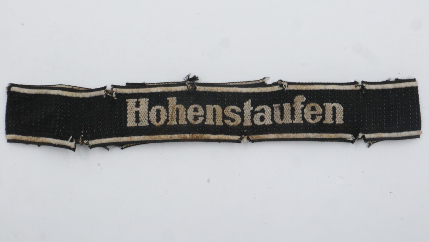 Third Reich 9th SS Panzer Division cuff title. Marked: “Bevo Wuppental”. Passes the UV-black light