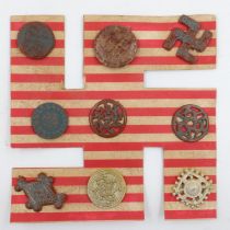 Third Reich Archaeology Set of Winterhilf Tinnie Badges. The set of 9 badges are a portrayal of
