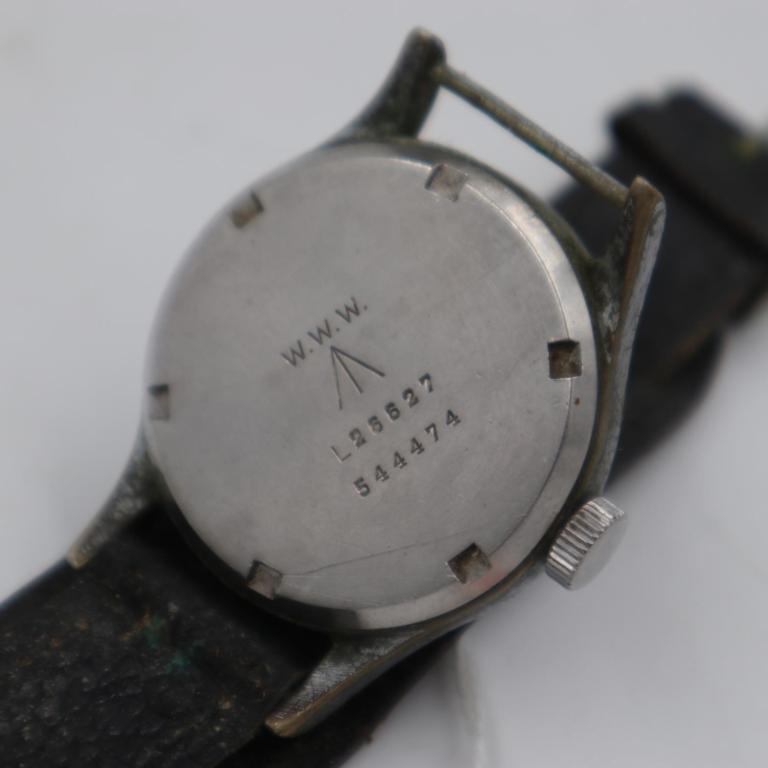 RECORD: A WWII British military issue stainless steel 'Dirty Dozen' wristwatch head, marked on - Image 4 of 4