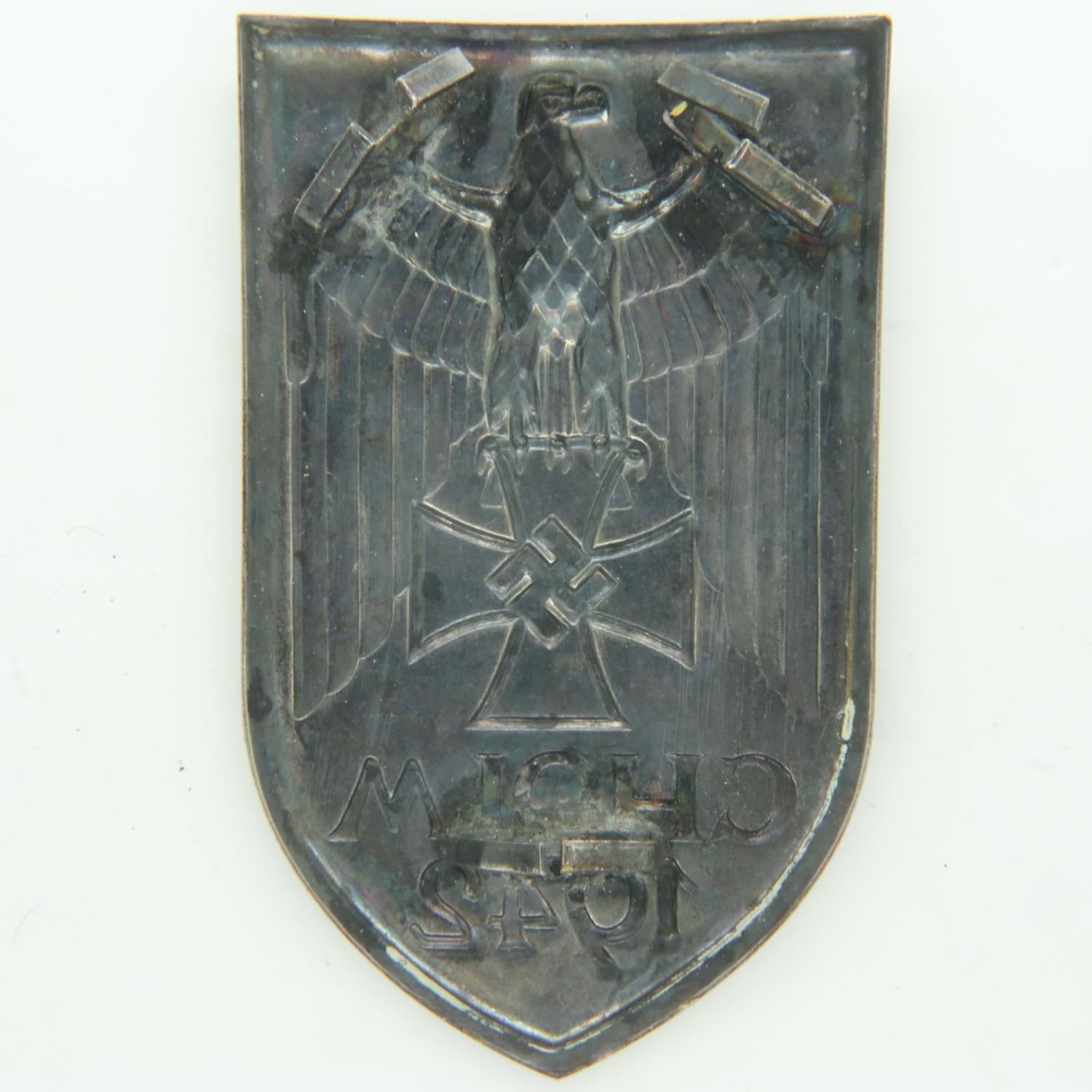 German pressed metal CHOLM 1942 arm shield. UK P&P Group 0 (£6+VAT for the first lot and £1+VAT - Image 2 of 2