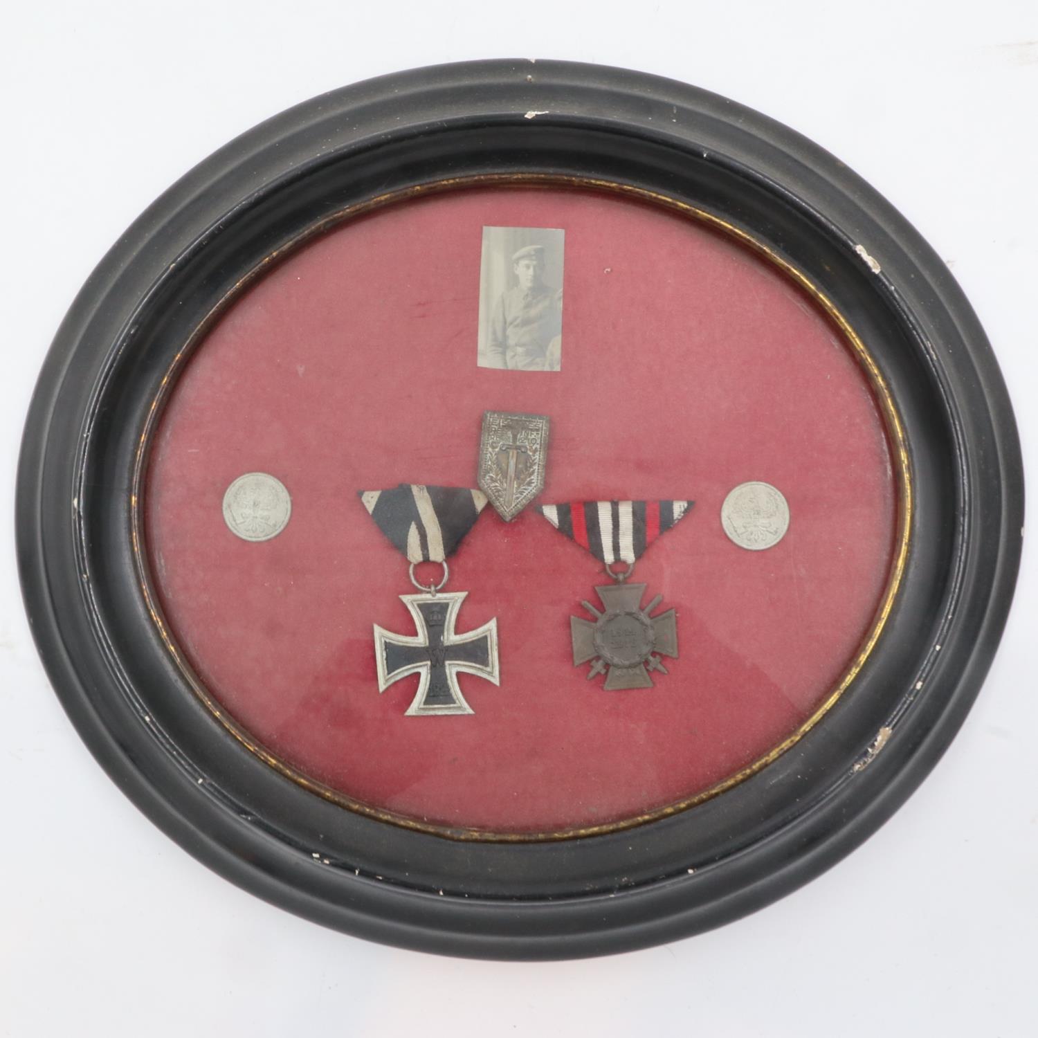 Framed WWI Imperial German Iron Cross 2nd class and Hindenburg Field Service Cross, with a