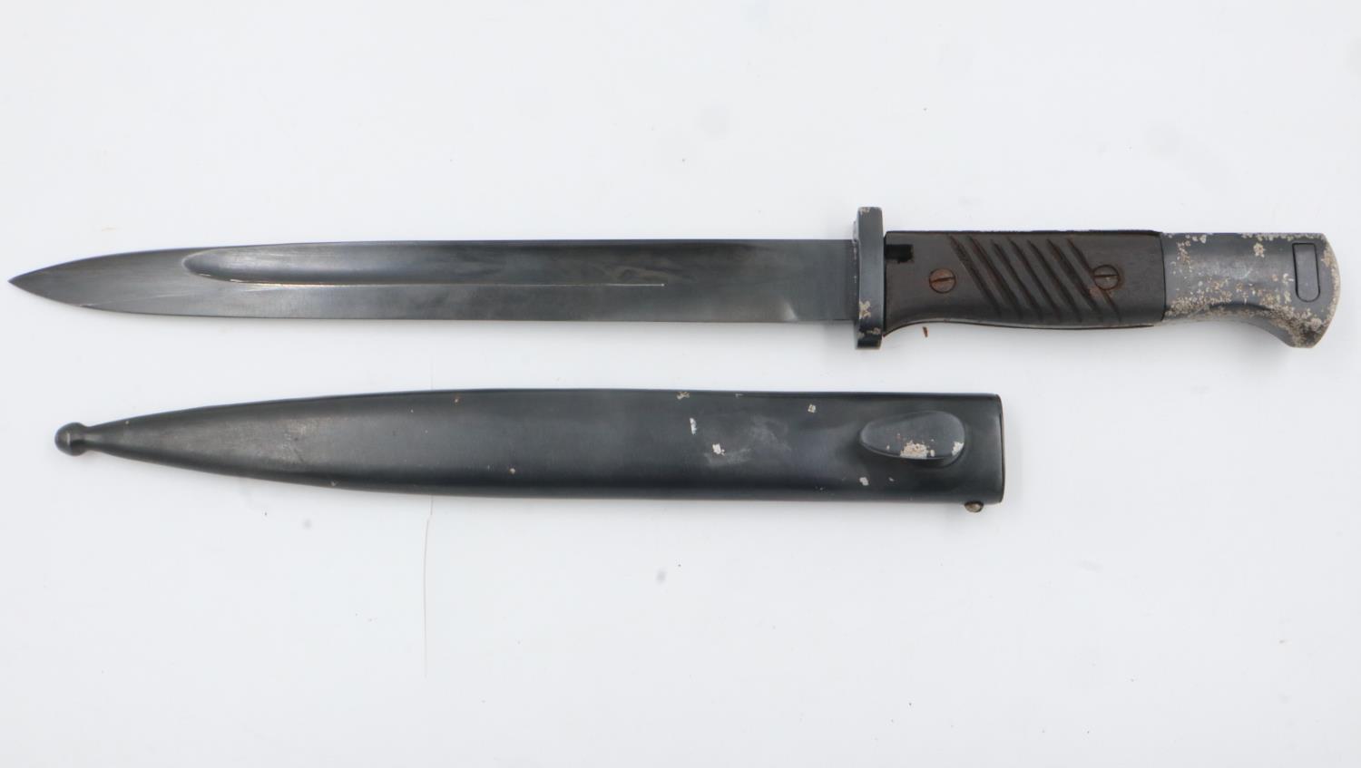 A German WWII K98 bayonet with steel scabbard. UK P&P Group 2 (£20+VAT for the first lot and £4+